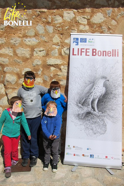 Children with Bonelli’s Eagles masks which they had painted and shaped themselves on the Day of the Eagle.
